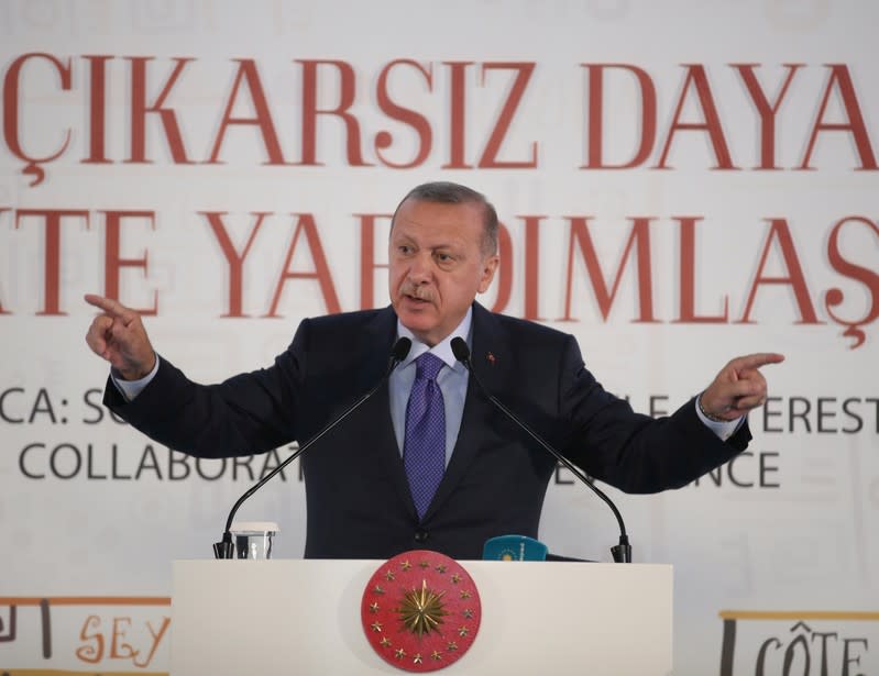 Turkish President Erdogan speaks during a meeting in Istanbul