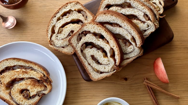 Sliced cinnamon-apple swirl bread on platter