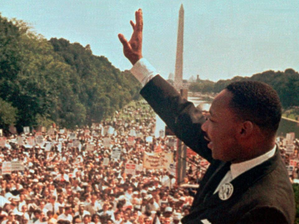 Dr. Martin Luther King Jr. acknowledges the crowd at the Lincoln Memorial for his "I Have a Dream" speech during the March on Washington, D.C. on Aug. 28, 1963.