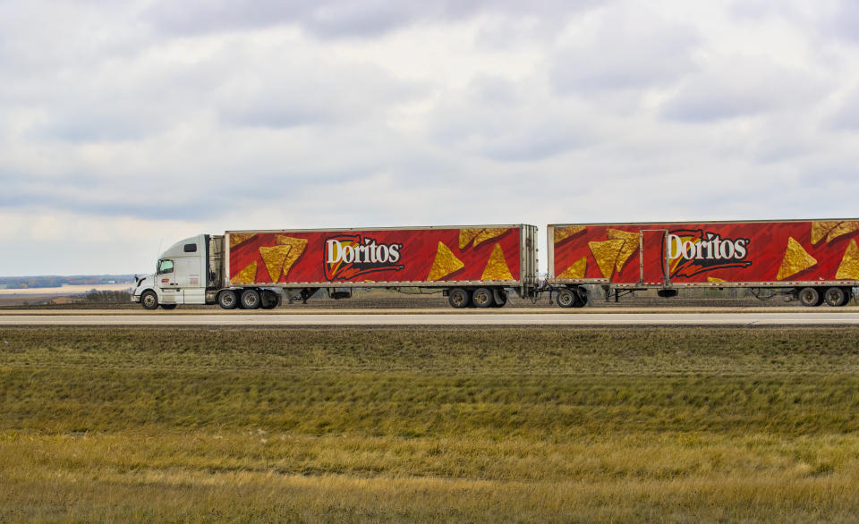 A Dorittos truck hauling cargo north on the Queen Elizabeth II Highway near Red deer, Alberta. Taken on October 1, 2018