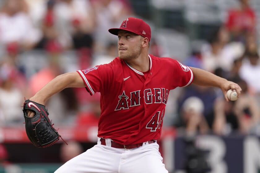 Los Angeles Angels starting pitcher Reid Detmers throws to the plate during the second inning.