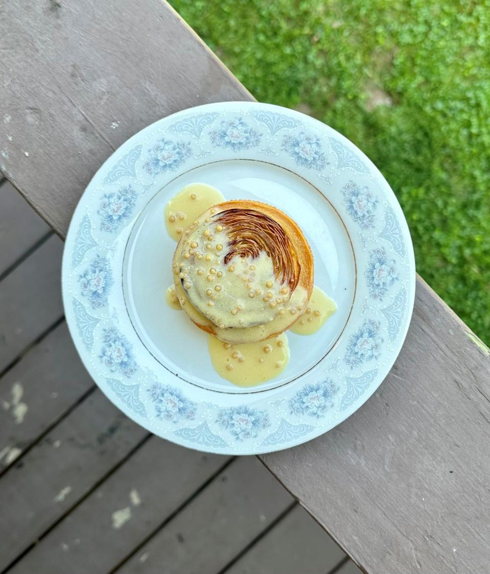 Celery root tart with mustard, a dish served at a dining event hosted by Not Another Supper Club.