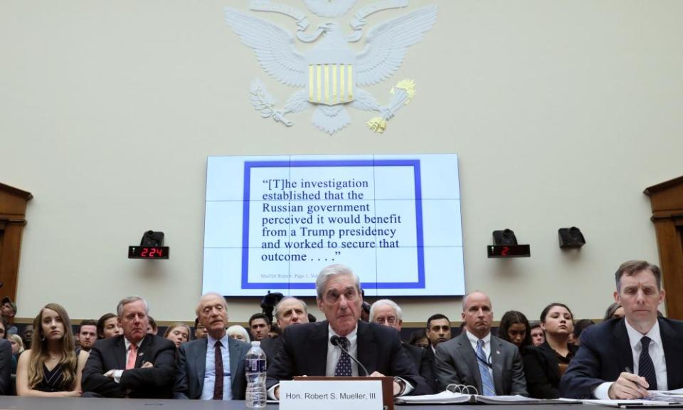 Robert Mueller, center, testifies before the House judiciary committee on Capitol Hill in Washington, on 24 July.