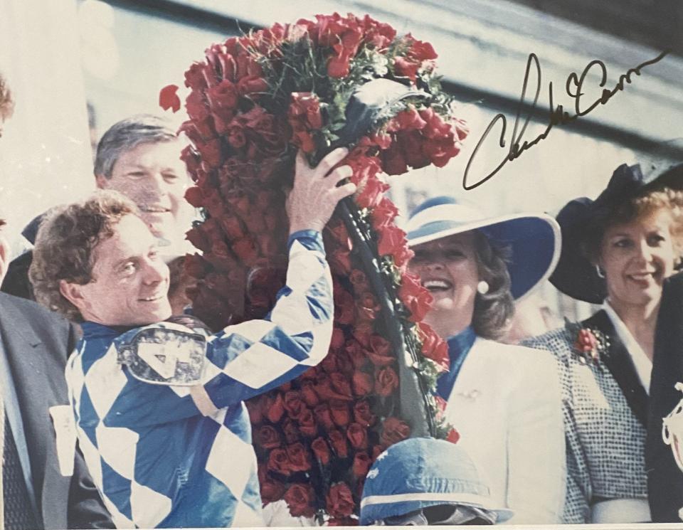 An autographed photo of jockey Chris McCarron after winning the 1987 Derby aboard Alysheba.