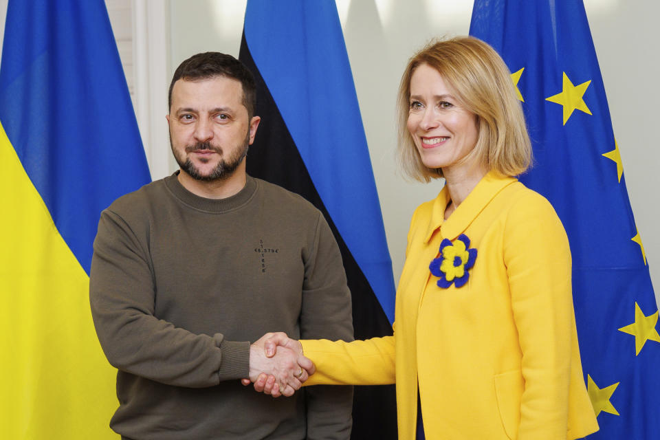 Estonia's Prime Minister Kaja Kallas, right, shakes hands with Ukrainian President Volodymyr Zelenskyy during their meeting, in Tallinn, Estonia, Thursday, Jan.11, 2024. (AP Photo)