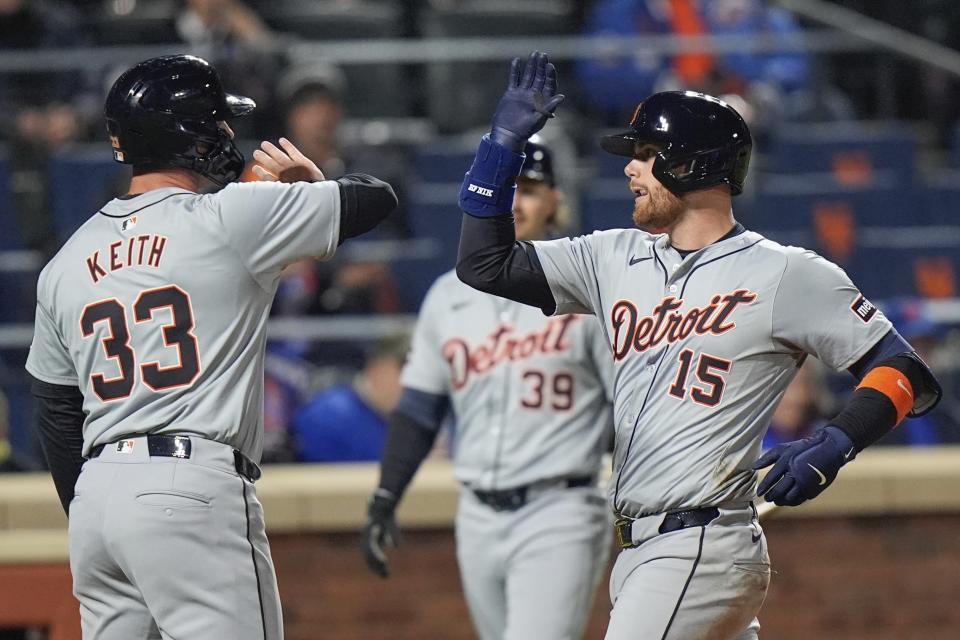 Detroit Tigers' Carson Kelly (15) celebrates with teammate Colt Keith (33) after hitting a three-run home run during the tenth inning of a baseball game against the New York Mets Monday, April 1, 2024, in New York. (AP Photo/Frank Franklin II)