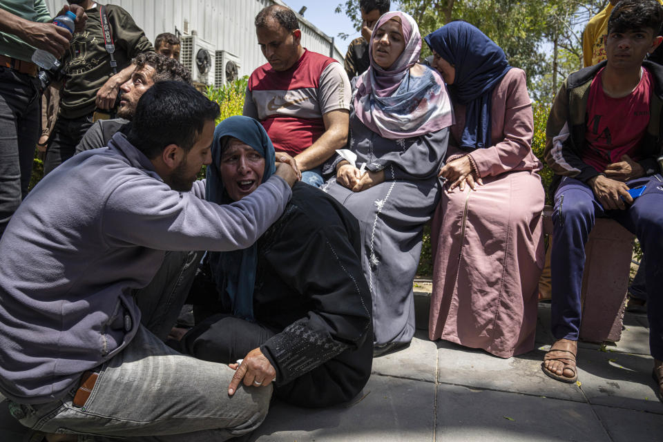 Palestinians mourn for Mohammed Abu Taima, killed in an Israeli airstrike, in Khan Younis in the Gaza Strip, Wednesday, May 10, 2023. Israeli authorities say Palestinian militants in the Gaza Strip have launched rockets toward southern Israel. Wednesday's launch comes a day after Israeli airstrikes killed three militant leaders and at least 10 civilians. (AP Photo/Fatima Shbair)