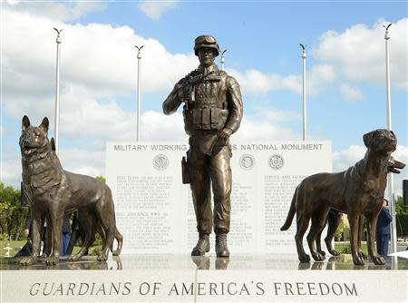 The newly unveiled U.S. Military Working Dog Teams National Monument is seen at Joint Base San Antonio-Lackland, in San Antonio, Texas October 28, 2013. REUTERS/Benjamin Faske/USAF/Handout