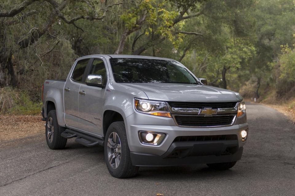 This photo provided by Chevrolet shows the 2018 Colorado. This midsize truck is available with a four-cylinder engine, a V6 or a turbocharged diesel four-cylinder. (Courtesy of General Motors via AP)