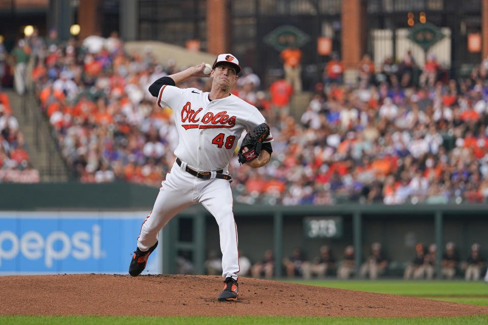 Baltimore Orioles starting pitcher Kyle Gibson throws to the New York Mets in the first inning of a baseball game, Saturday, Aug. 5, 2023, in Baltimore. (AP Photo/Julio Cortez)