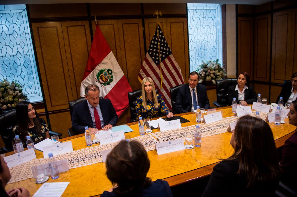 Ivanka Trump attempts to represent women’s economic empowerment, while sitting in between men. (Photo: Getty Images)