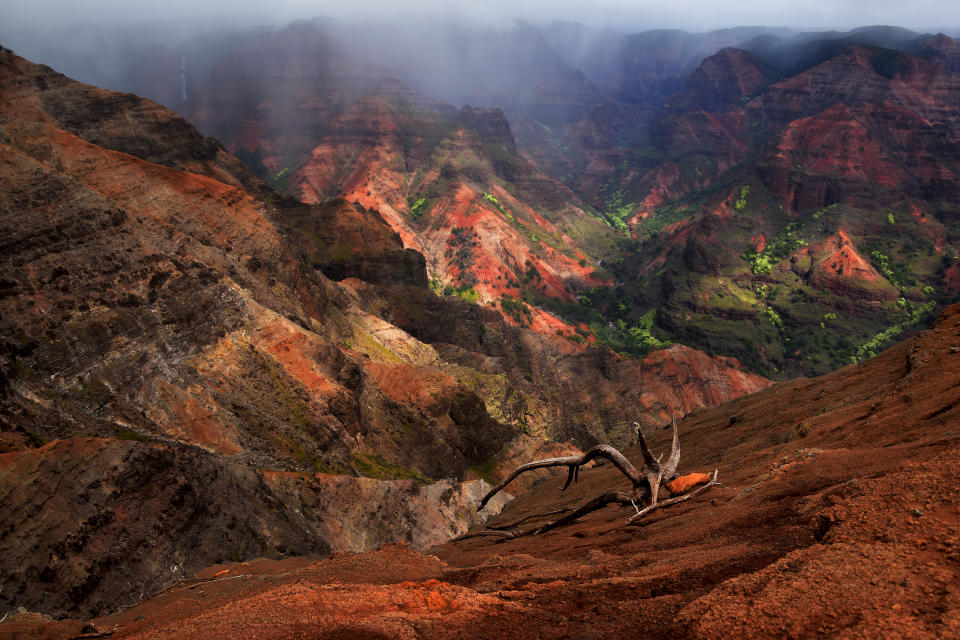 The view of majestic Waimea Canyon is a sight to behold. (Photo: Getty)