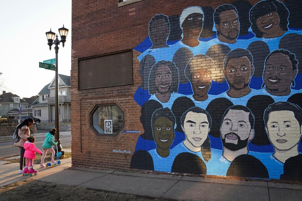 A mural in Minneapolis portrays various people who died in police custody.