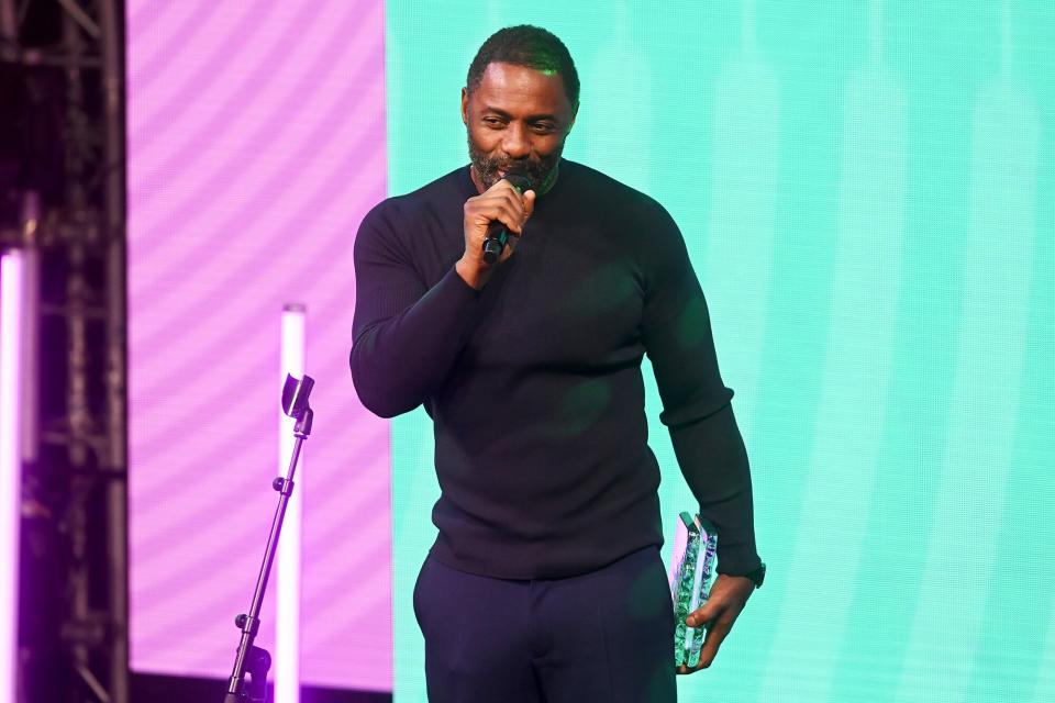 Idris Elba presents Pete Tong with the Music Industry Trust Award of the Year 2021 at The Grosvenor House Hotel on November 01, 2021 in London, England