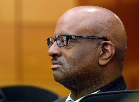 Former Atlanta Public Schools School Resource Team Executive Director Michael Pitts listens to his daughter Kristen, during witness statements during sentencing of racketeering charges in one of the largest U.S. test-cheating scandals in Atlanta, Georgia April 13, 2015. REUTERS/Kent D. Johnson/Pool
