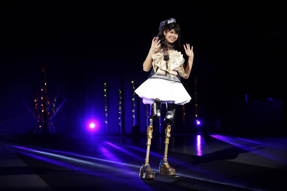 Erina Yuguchi, an athlete, participates in a fashion show dubbed "Amputee Venus Show" in Tokyo on Tuesday, Aug. 25, 2020. The fashion show was held in conjunction with the opening of the Tokyo Paralympic Games, now scheduled to open on Aug. 24, 2021. (AP Photo/Hiro Komae)