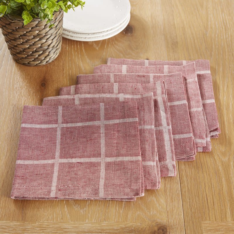 This weathered <a href="https://www.wayfair.com/kitchen-tabletop/pdp/birch-lane-jonesport-napkins-bl21810.html?piid%5B0%5D=20106083&amp;piid[0]=20106085&amp;piid=20106085" target="_blank">plaid&nbsp;napkin set</a>&nbsp;gives these everyday napkins a timeless farmhouse feel.