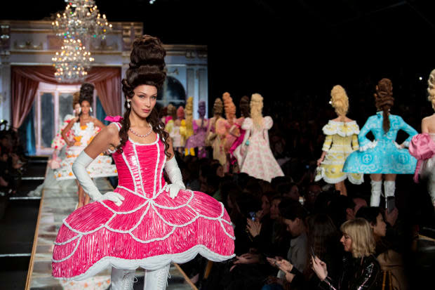 Bella Hadid on the runway at Moschino's Fall 2020 show.