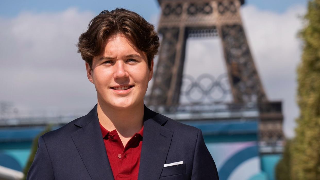 Crown Prince Christian standing in front of Eiffel Tower at Paris 2024 Paralympics