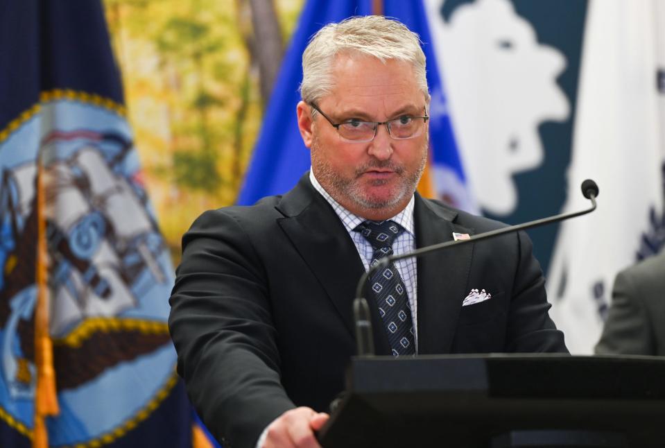 Ingham County Prosecutor John Dewane speaks Wednesday, Dec. 13, 2023, during a press conference at Lansing City Hall, where officials announced federal charges in the death of a 2-year-old killed at Lansing gas station.