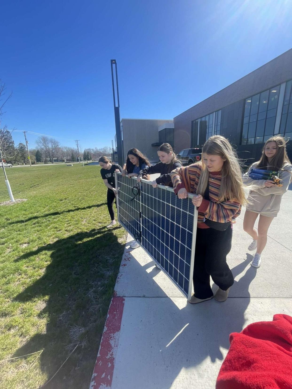 A group of Ames High School students who call themselves "Solar Rangers" have taken their science project on solar panels to the district as a possible energy alternative.