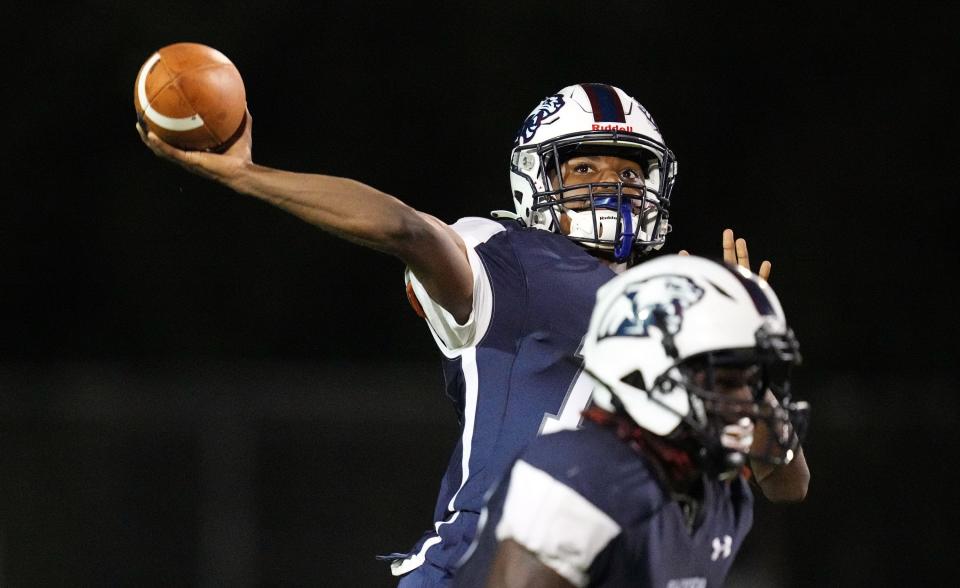 Dwyer quarterback Derrick Flanders (18) drops back to pass against Jensen Beach on Friday, September 1, 2022 in Palm Beach Gardens.