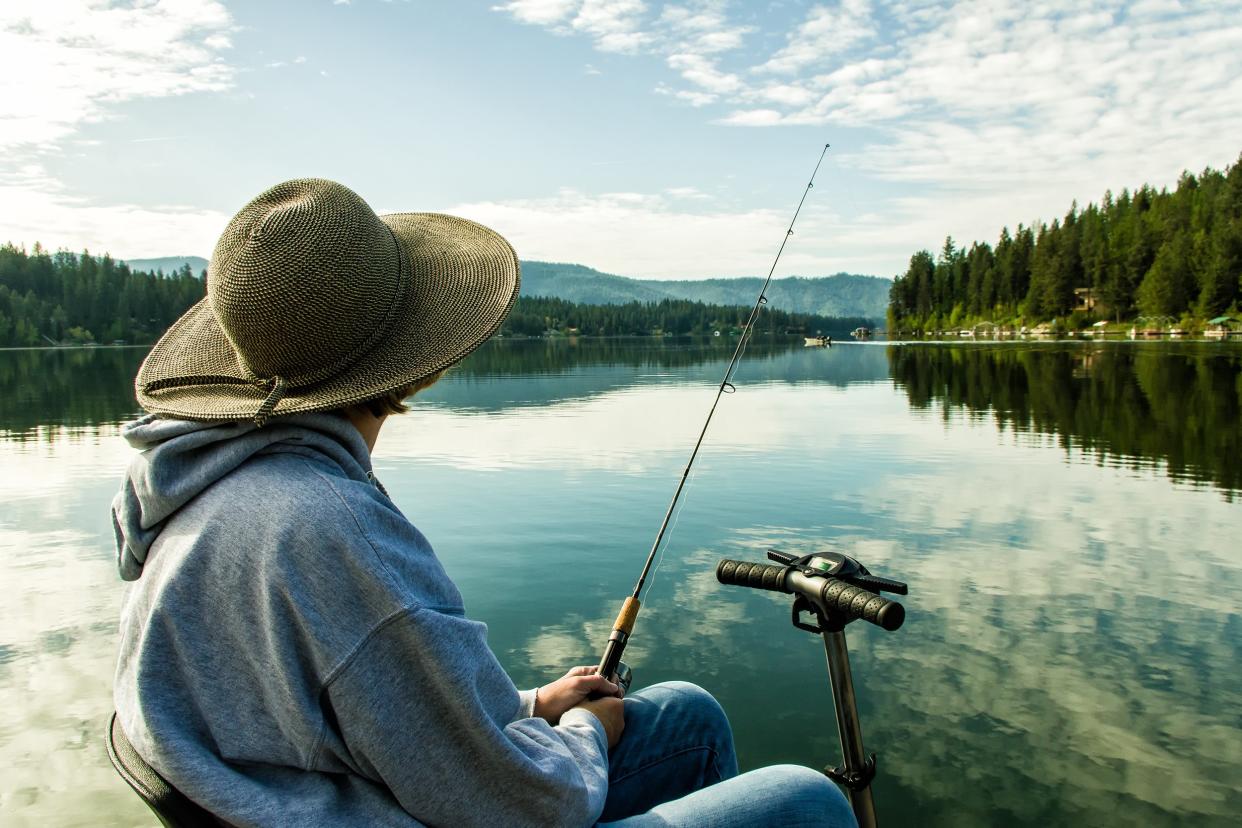 disabled senior woman fishing at a lake in Northern Idaho