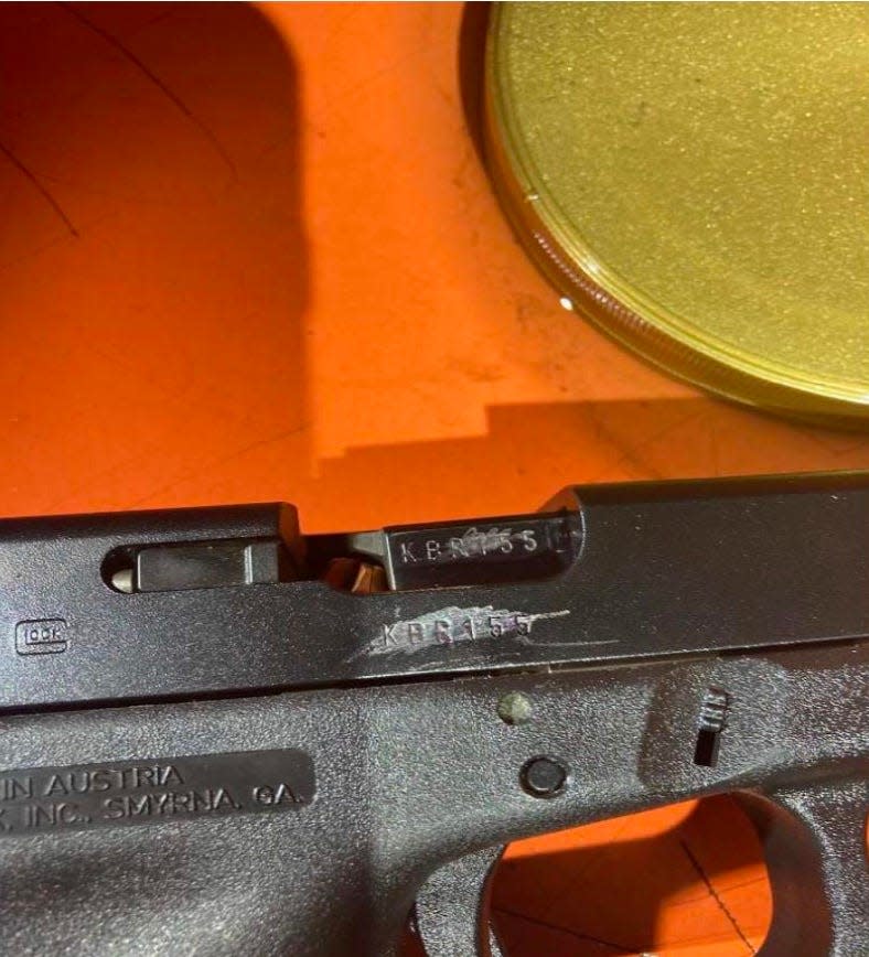 In this photo included in a federal complaint against Frank James, the serial number of a Glock 17 pistol appear to be defaced. According to the complaint, the firearm was recovered from the scene of a shooting in a Brooklyn subway station on April 12, 2022. 