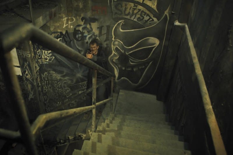 Joel Kinnaman climbs four flights of stairs fighting along the way in "Silent Night." Photo courtesy of Lionsgate