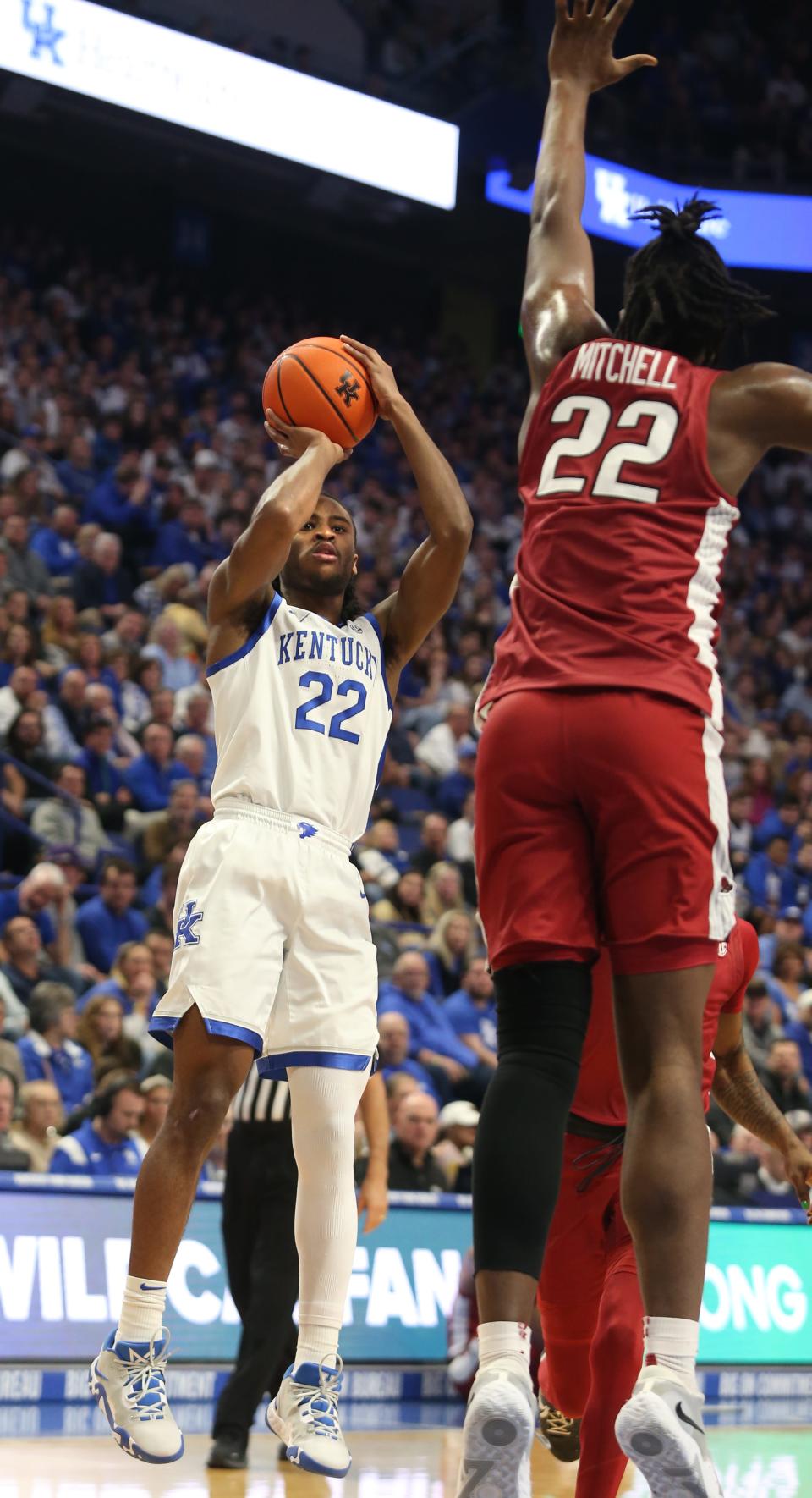 Kentucky’s Cason Wallace makes the basket and gets fouled against Arkansas’ Makhel Mitchell.Feb. 7, 2023