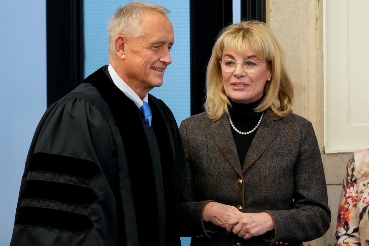 Former Hamilton County Prosecutor Joe Deters, now an Ohio Supreme Court justice, stands with his successor, Melissa Powers, in January 2023.