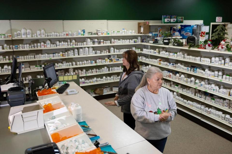 Employees at Jordan Drug in Beattyville, Ky, Tuesday, December 5, 2023. Pharmacist and co-founders of KIPA (Kentucky Independent Pharmacist Alliance) Rosemary Smith is concerned about the closing of rural pharmacies, where independent pharmacies are the only pharmacy in their county.