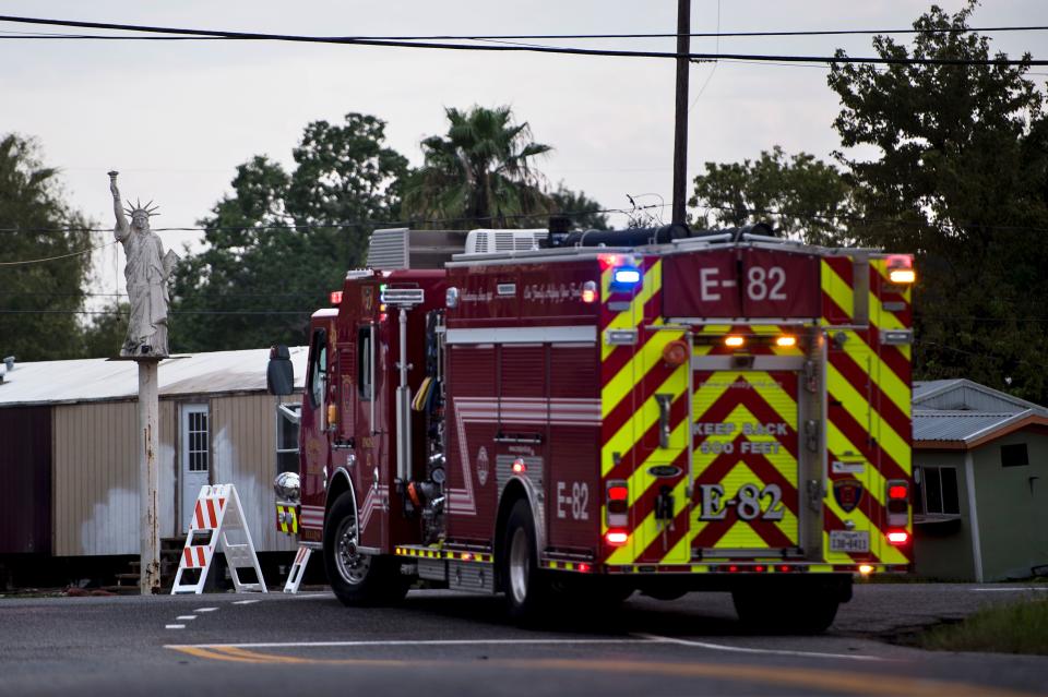 <p>A firetruck waits at a roadblock after a chemical plant operated by the Arkema Group had an explosion during the aftermath of Hurricane Harvey on .Aug. 31, 2017 in Crosby, Texas. (Photo: Brendan Smialowski/AFP/Getty Images) </p>