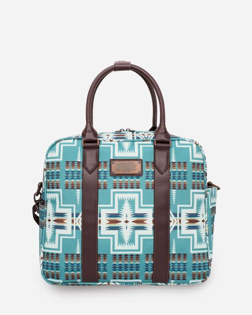 <p>pendleton-usa.com</p><p><strong>$159.00</strong></p><p><a href="https://www.pendleton-usa.com/product/harding-weekender-bag/O-23121-40-WK-X000026-UNIT.html?rv=true" rel="nofollow noopener" target="_blank" data-ylk="slk:Shop Now;elm:context_link;itc:0;sec:content-canvas" class="link ">Shop Now</a></p><p>Ree is a big fan of Pendleton's woven blankets and coats, so this printed turquoise bag would be a big hit with her! The print was inspired by a ceremonial blanket presented to First Lady Florence Harding back in 1923. </p>