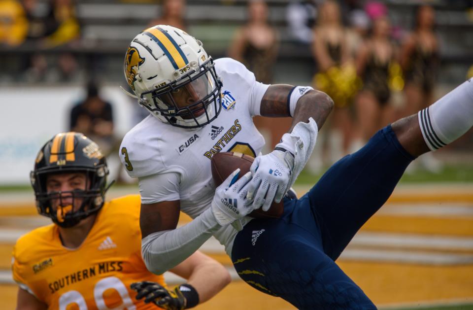 Florida International running back Shaun Peterson Jr. (3) catches a ball during the first quarter of a football game against Southern Miss in Hattiesburg, Miss., on Saturday, Nov. 27, 2021.