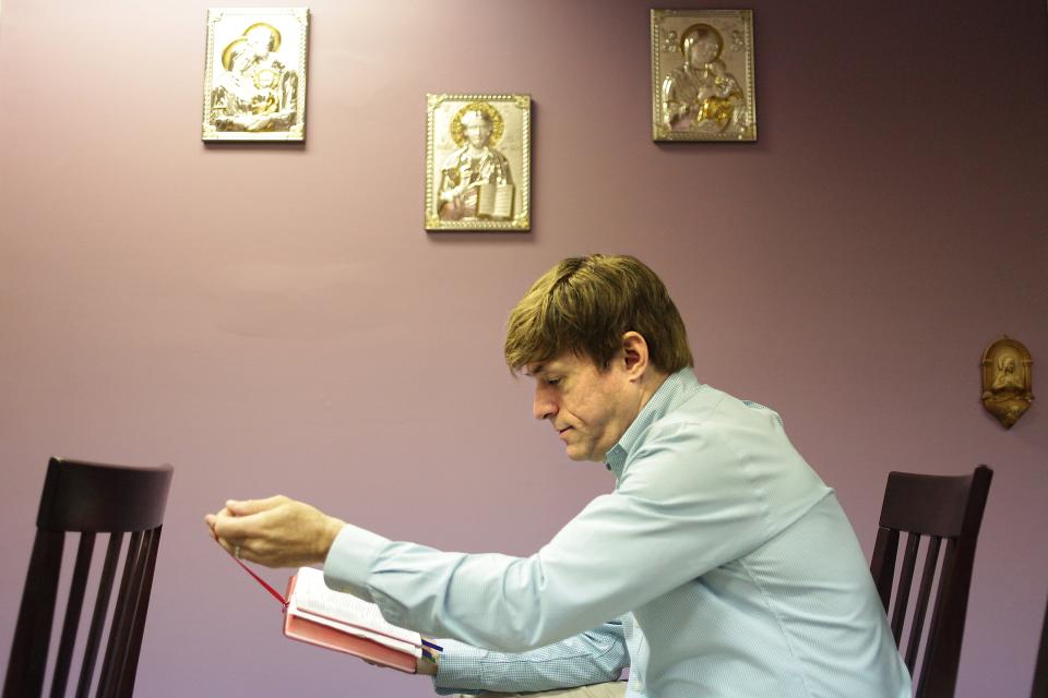 Michael Voris takes a moment of reflection and prayer in the chapel at his media studio in Ferndale, Mich., on Friday, Feb. 10, 2012. He was the founder and president of St. Michael's Media, which produced Real Catholic TV, later called Church Militant.