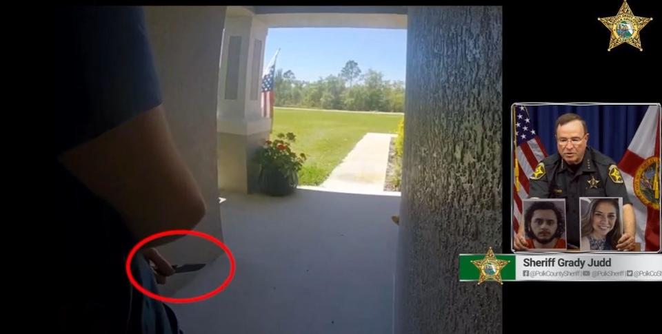 Polk County Sheriff Grady Judd shows a frontdoor video of Emmanuel Espinoza holding a small pocketknife behind his back moments before his mother answered the door.