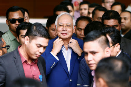 Malaysia's former prime minister Najib Razak leaves after giving a statement to the Malaysian Anti-Corruption Commission (MACC) in Putrajaya, Malaysia May 22, 2018. REUTERS/Lai Seng Sin