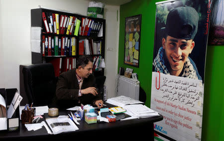 A poster of 17-year-old Palestinina Nadim Nuwara is seen inside the office of Accountability for Violence Against Children organization, in Ramallah, in the occupied West Bank April 25, 2018.