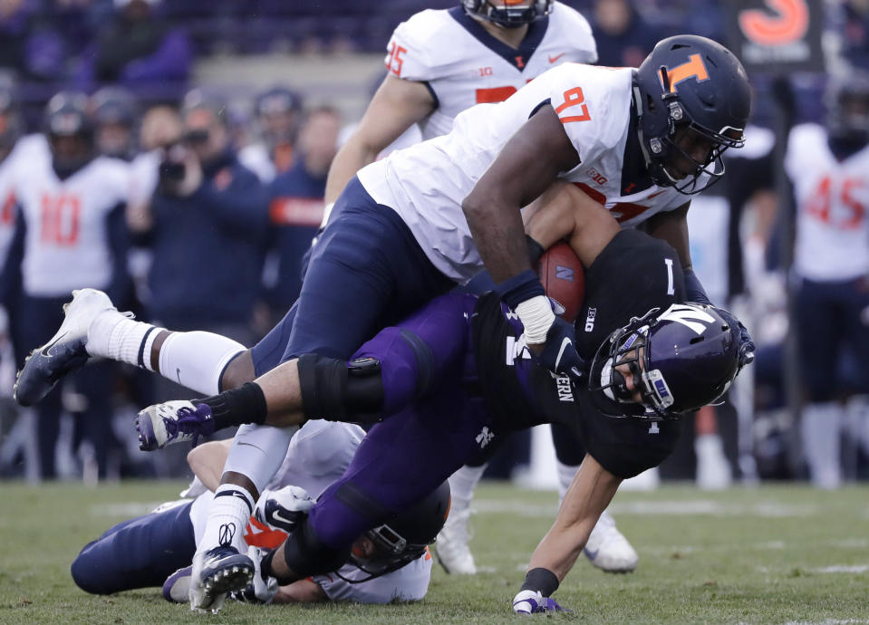 Illinois defensive lineman Bobby Roundtree suffered a severe spinal injury in a swimming accident.