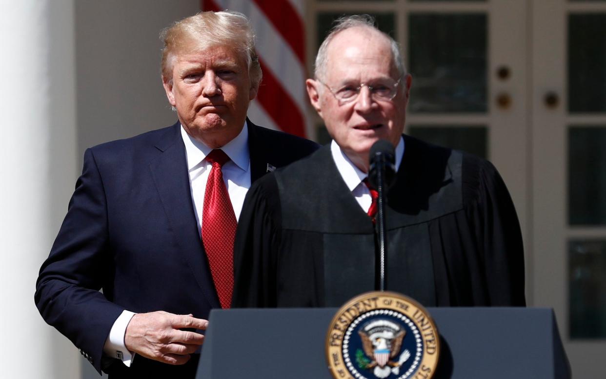 President Donald Trump, left, and Supreme Court Justice Anthony Kennedy participate in a public swearing-in ceremony for Justice Neil Gorsuch - AP