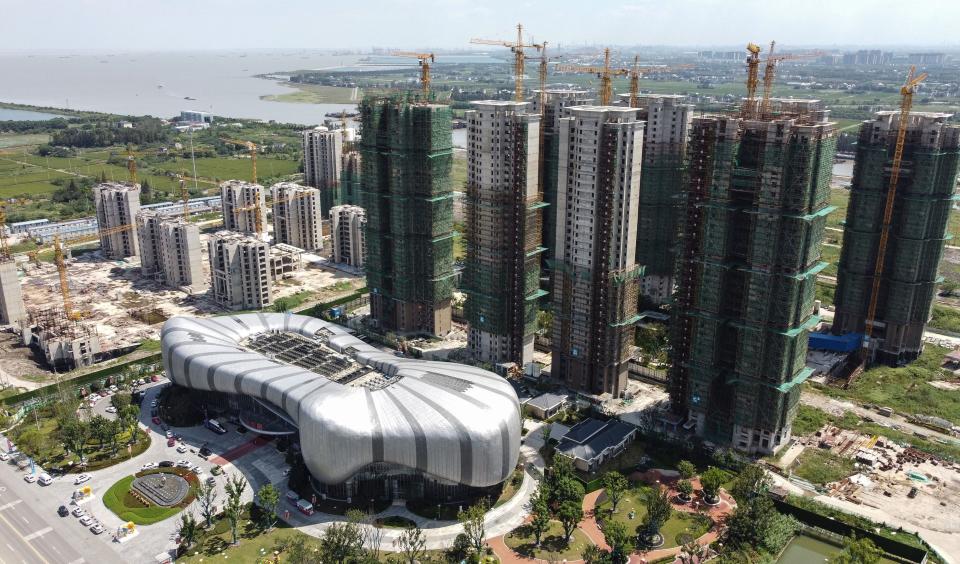 This aerial photo taken on September 17, 2021 shows the halted under-construction Evergrande Cultural Tourism City, a mixed-used residential-retail-entertainment development, in Taicang, Suzhou city, in China's eastern Jiangsu province. (Photo by Vivian LIN / AFP) (Photo by VIVIAN LIN/AFP via Getty Images)