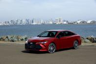 <p><a rel="nofollow noopener" href="https://www.caranddriver.com/toyota/avalon" target="_blank" data-ylk="slk:The Toyota Avalon;elm:context_link;itc:0;sec:content-canvas" class="link ">The Toyota Avalon </a>is larger than the brand's best-selling Camry and offers far more rear-seat room and takes a stronger luxury stand. Its wild styling-particularly the gaping maw of a front grille-impart a sporty appearance, and the XSE and Touring trims actually deliver some verve. The standard Avalon comes with a 301-hp V-6 engine and front-wheel drive, a combination good enough for <a rel="nofollow noopener" href="https://www.caranddriver.com/reviews/2019-toyota-avalon-test-review" target="_blank" data-ylk="slk:a 6.1-second run from zero-to-60 mph;elm:context_link;itc:0;sec:content-canvas" class="link ">a 6.1-second run from zero-to-60 mph</a> at our test track.</p>