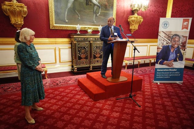 Lord Boateng speaking as the Queen looks on