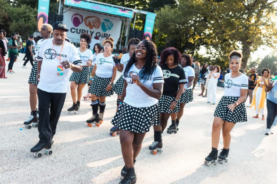 “Skaterobics” founder Tanya Dean (center) and her crew performing. (Photo: Vonecia Carswell)