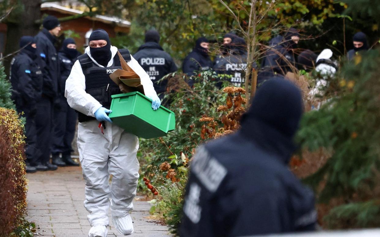 Police during a raid in Berlin in December 2022