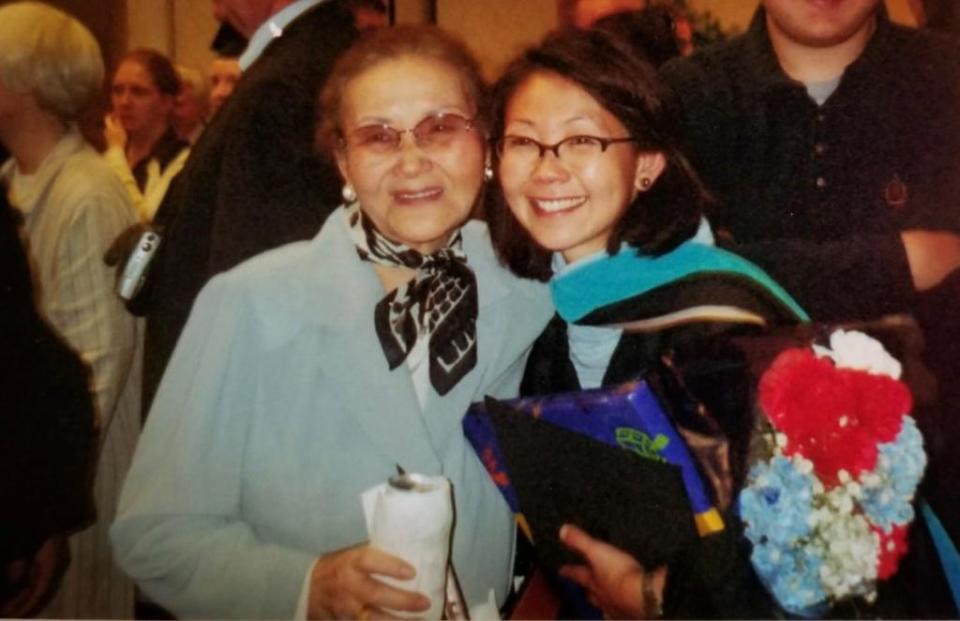 Christine Ahn celebrates her graduate school commencement ceremony at Georgetown University in 2001 with her mother, Byong Ok Ahn.