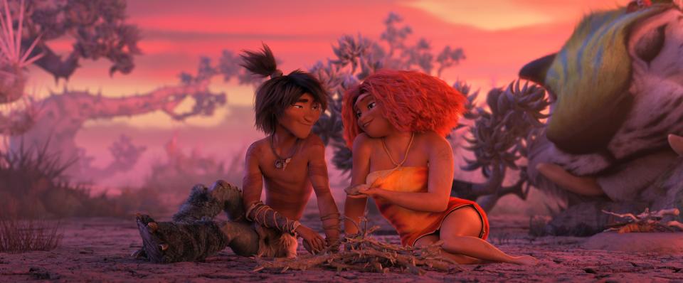 Guy (Ryan Reynolds) and Eep Crood (Emma Stone) in a scene from "The Croods: A New Age."