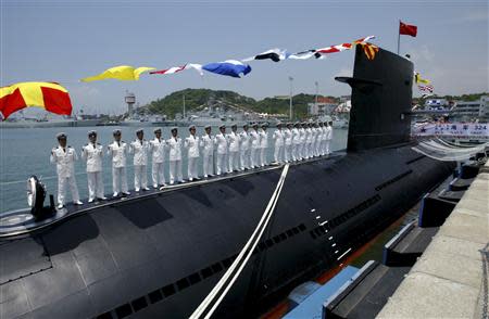 A Chinese naval submarine docks at the Ngong Shuen Chau Naval Base in Hong Kong in this April 30, 2004 file photo. REUTERS/Kin Cheung/Files