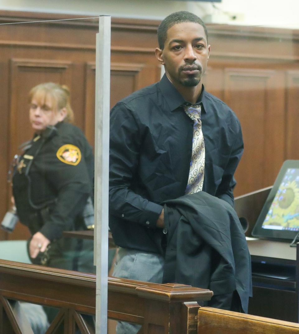 Eugene Wells is escorted from Judge Tammy O'Brien's courtroom during a break in proceedings. A jury found him guilty of murder in the shooting death of Walter Matthews III.